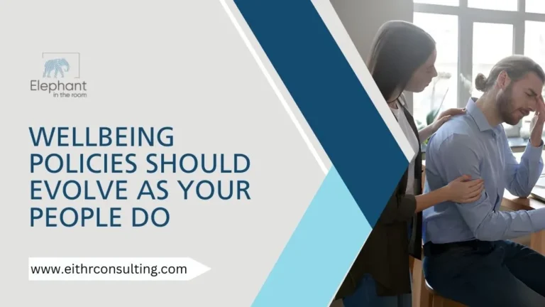 Team member comforting a stressed employee beside text about evolving workplace wellbeing policies.