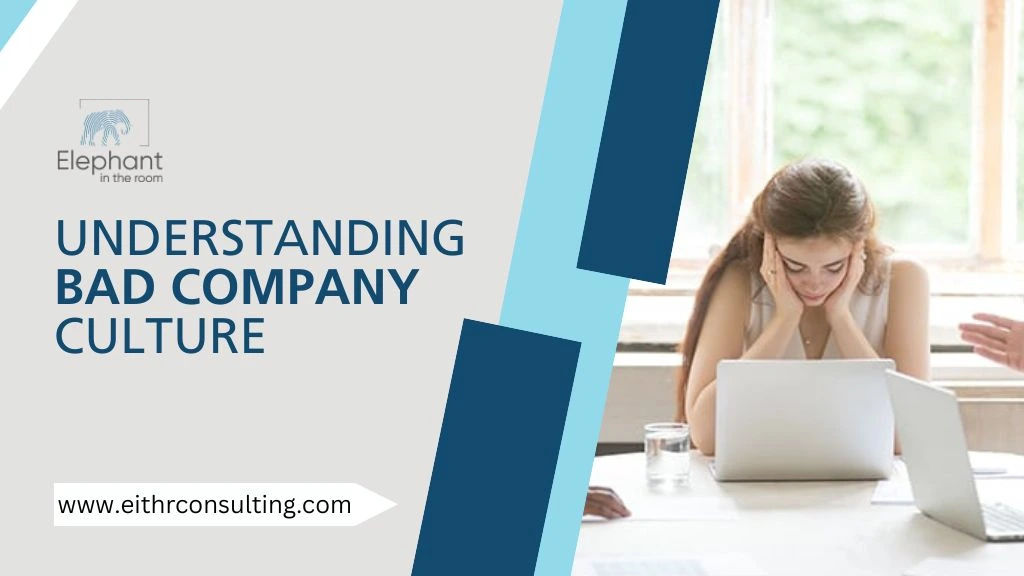 Stressed employee at laptop representing the effects of a bad company culture in the workplace