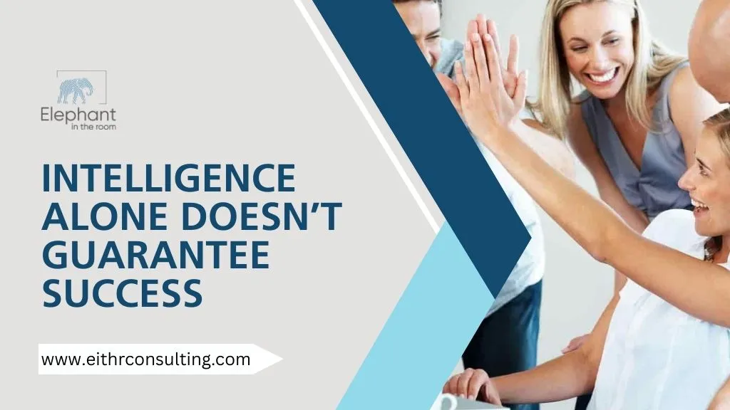 Team members high-fiving in an office setting, representing teamwork, emotional intelligence, and workplace collaboration beyond intelligence alone.